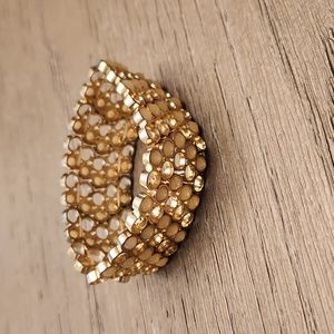 Stretch gold and cream color bracelet